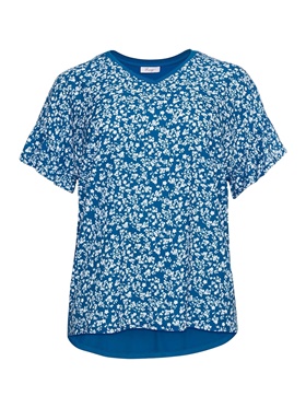Покупка с большой скидкой оригинальной блузки с эффектным сочетанием нежного цветочного принта на полочке и тонкого однотонного трикотажа на спинке в онлайн магазине Апарт
